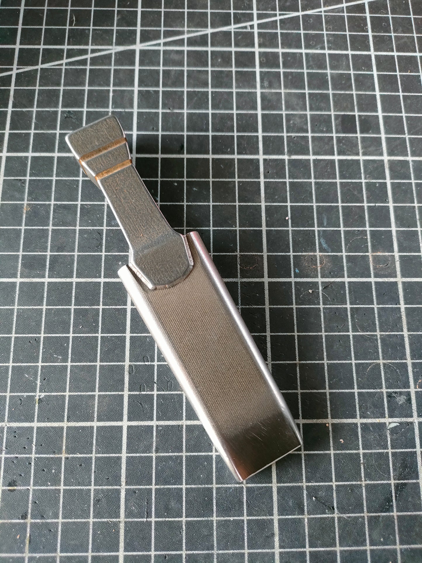 Custom oblong punches (sword handle)