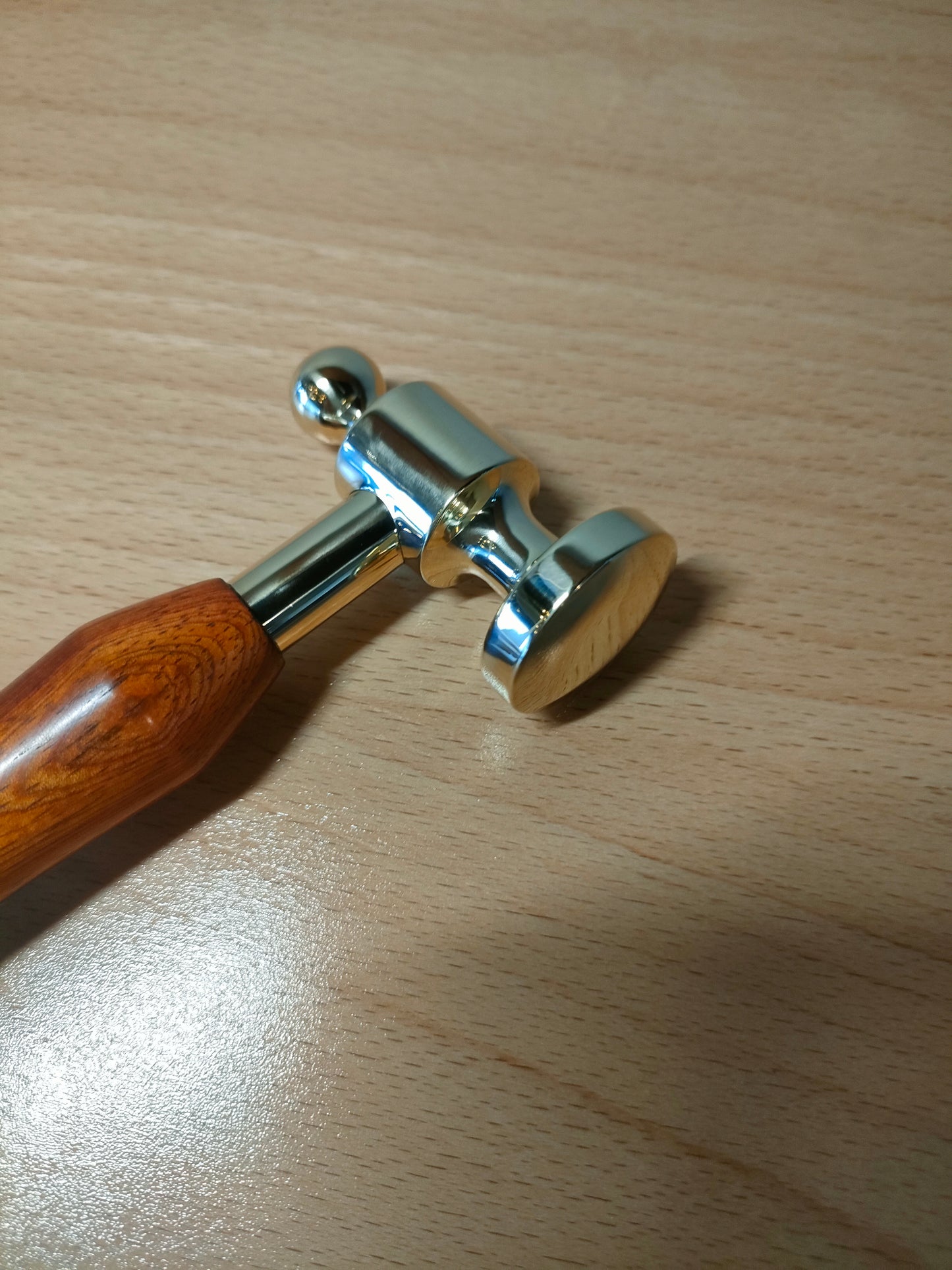 Custom brass hammer